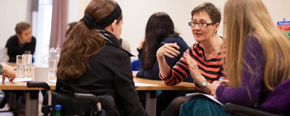 Disabled women in discussion.
