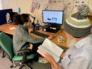 Advice centre service user receiving support.